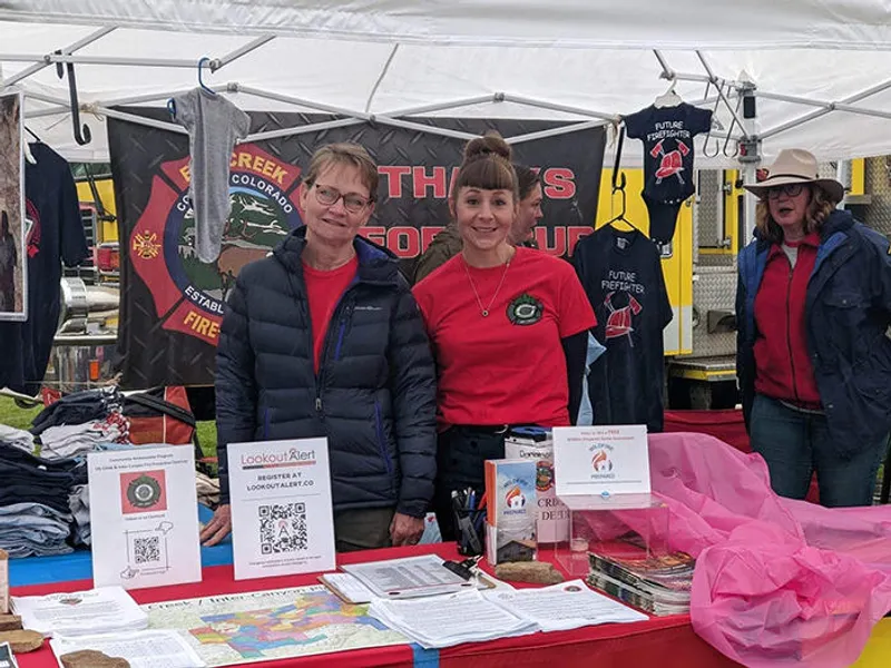Elk Creek Community Ambassadors booth at a community event